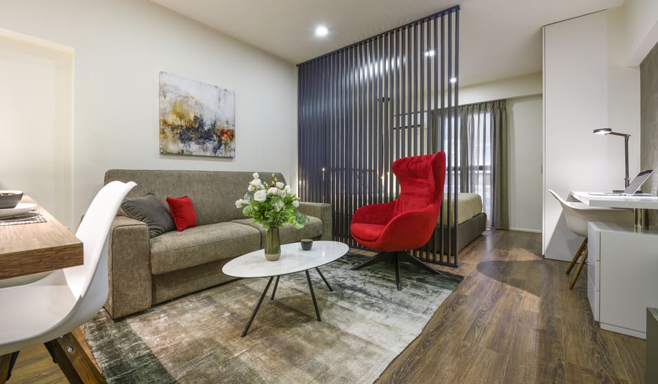 Apartment, City View | Living room | Flat-screen TV