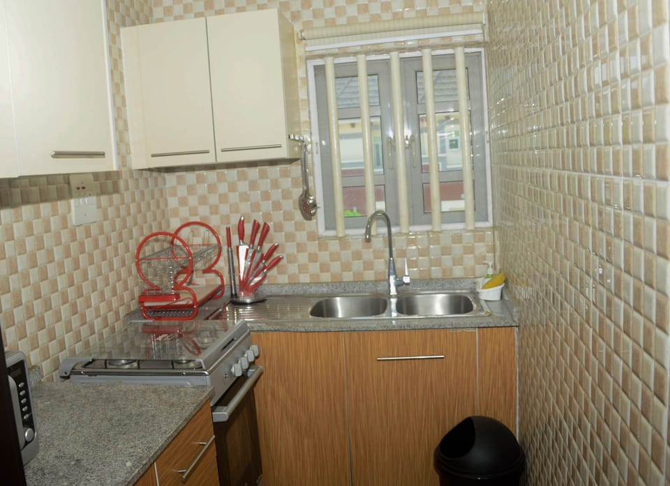 Luxury Apartment, 1 Bedroom | Private kitchen | Fridge, microwave, oven, stovetop