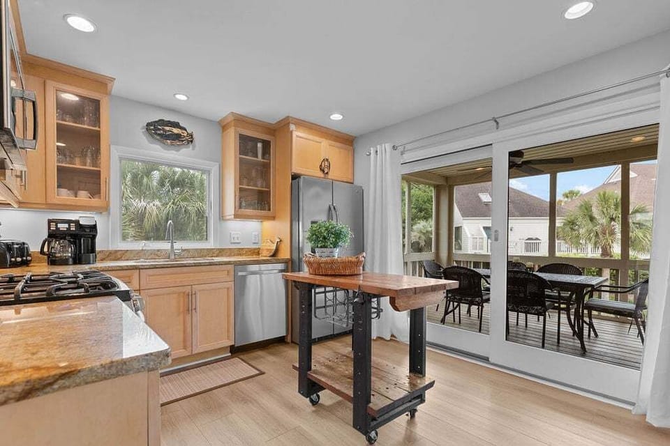 Screened in porch off the kitchen.  Enjoy outside dining if you would like.