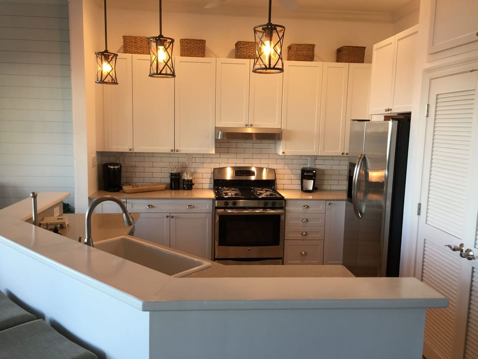 Open kitchen with under cabinet lighting