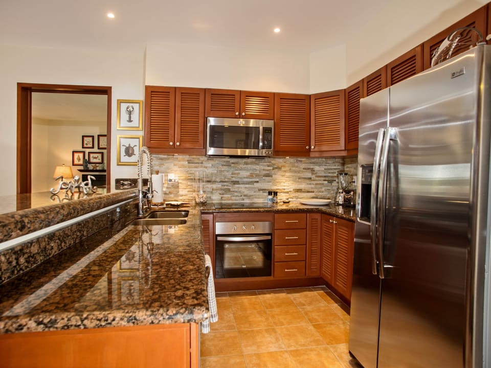 Designer finishes and fully equipped you will feel right at home in this kitchen