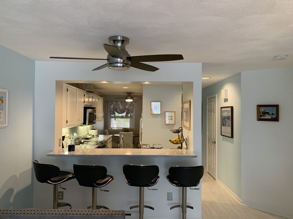 Breakfast bar with comfortable seating. 
