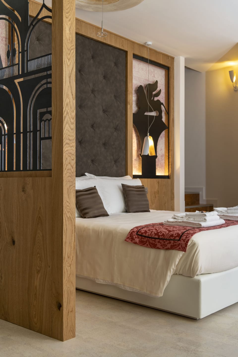 Suite | Down comforters, minibar, in-room safe, individually decorated
