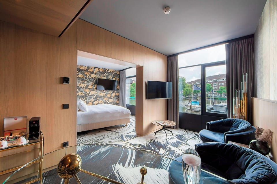 Design Room, 1 Bedroom, Canal View | Living room | LCD TV