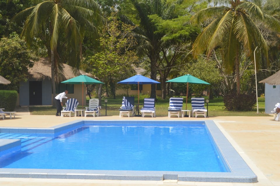Outdoor pool, pool umbrellas, sun loungers