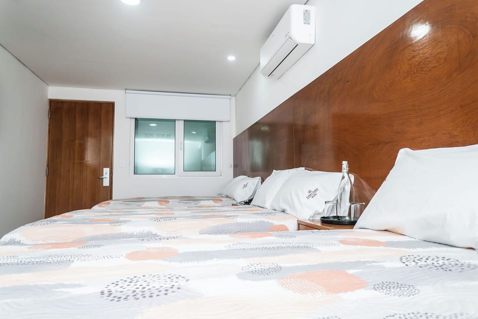 Triple Room | Egyptian cotton sheets, premium bedding, down comforters