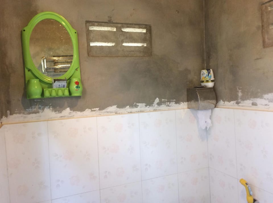 Shower, free toiletries, slippers, towels