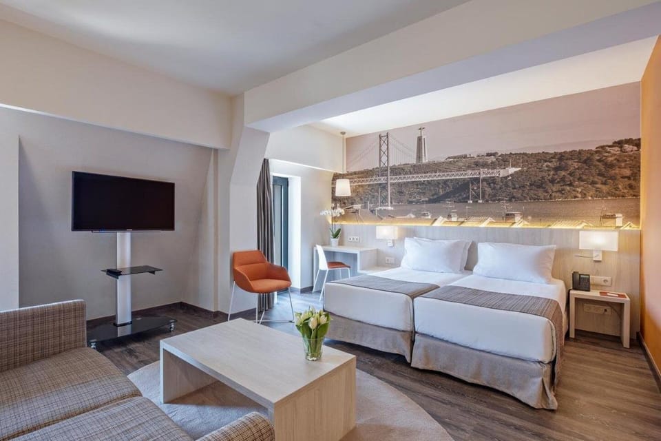 Triple Room | Minibar, in-room safe, desk, soundproofing