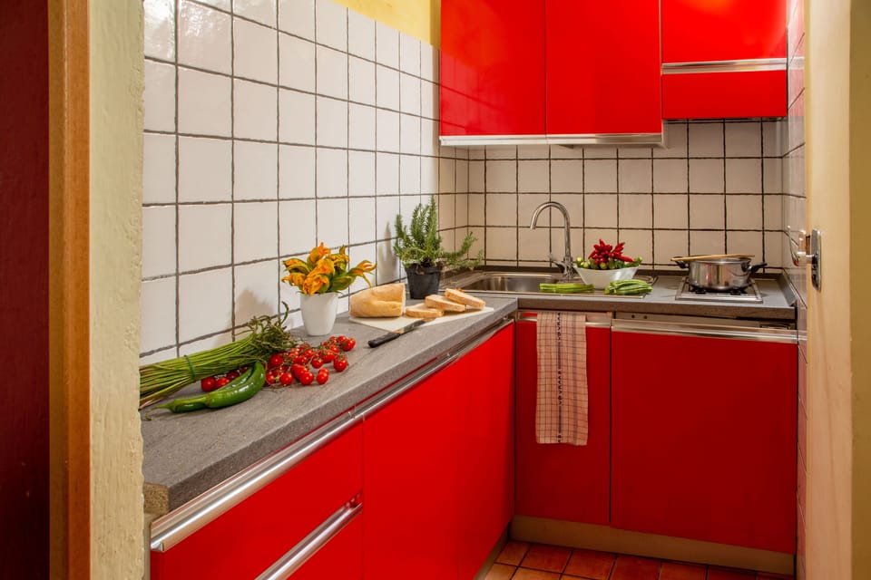 Family Room, Kitchen | Private kitchen | Fridge, coffee/tea maker, cookware/dishes/utensils
