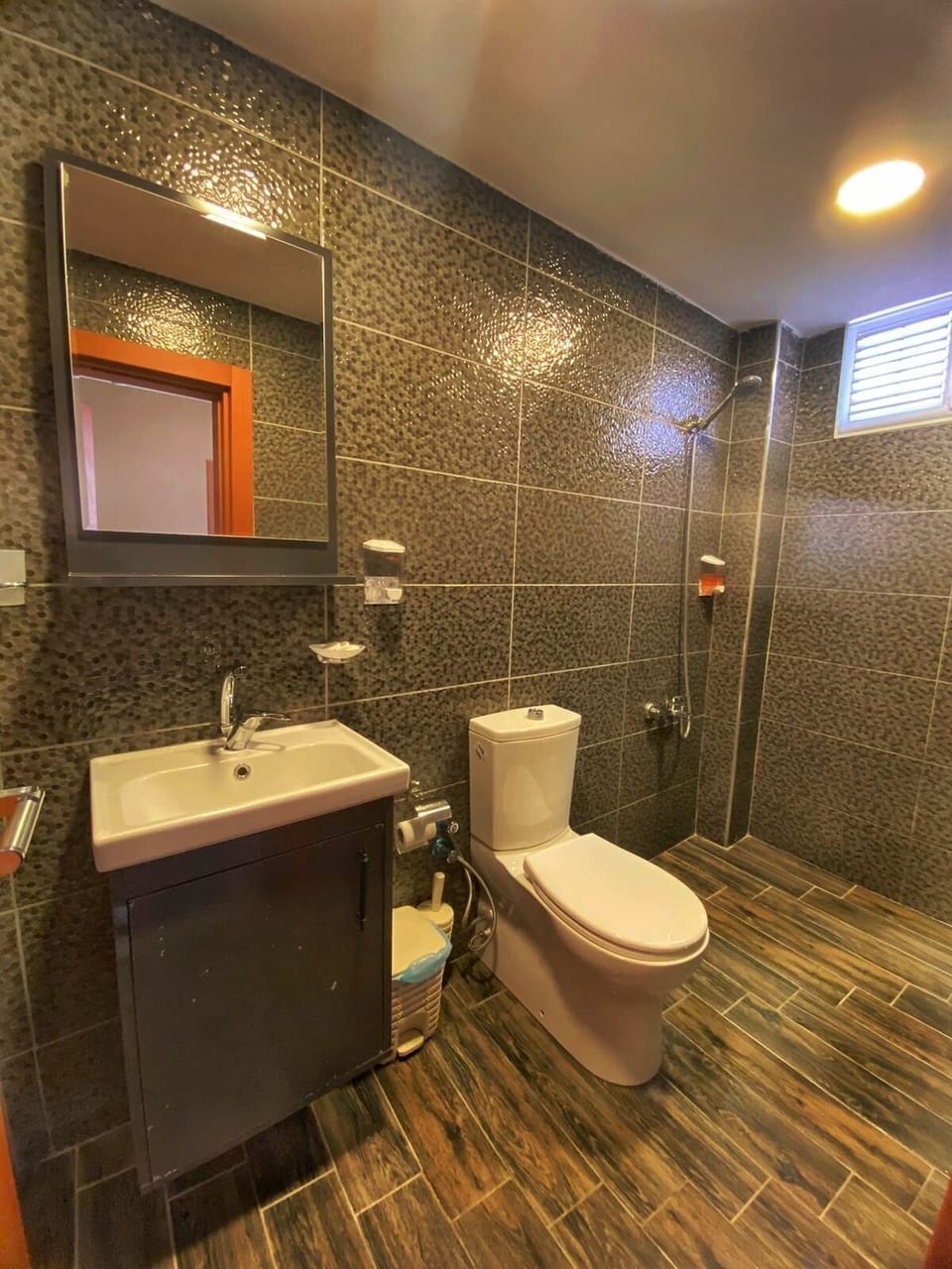 Shower, free toiletries, hair dryer, slippers