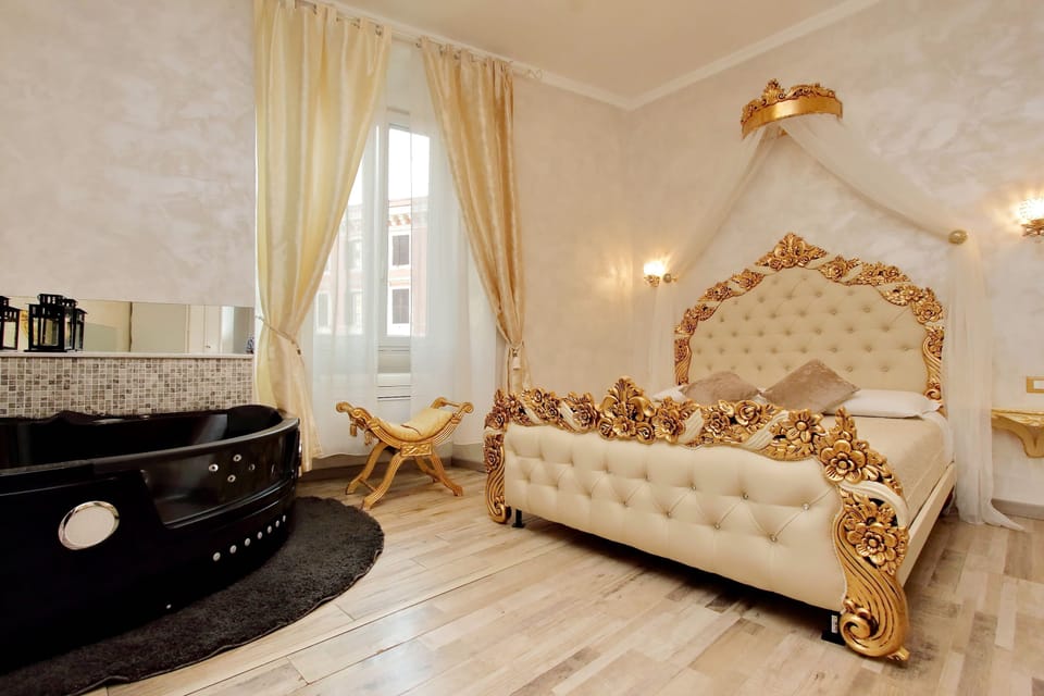 Deluxe Suite, Jetted Tub | Minibar, in-room safe, individually decorated, individually furnished