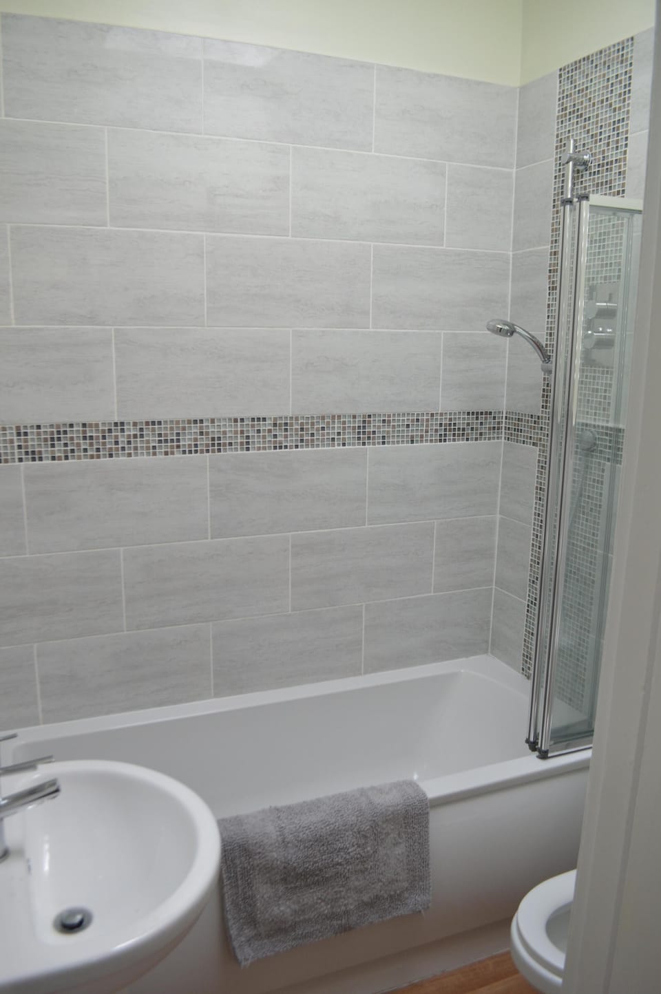 The main bathroom with Bath and Shower.
