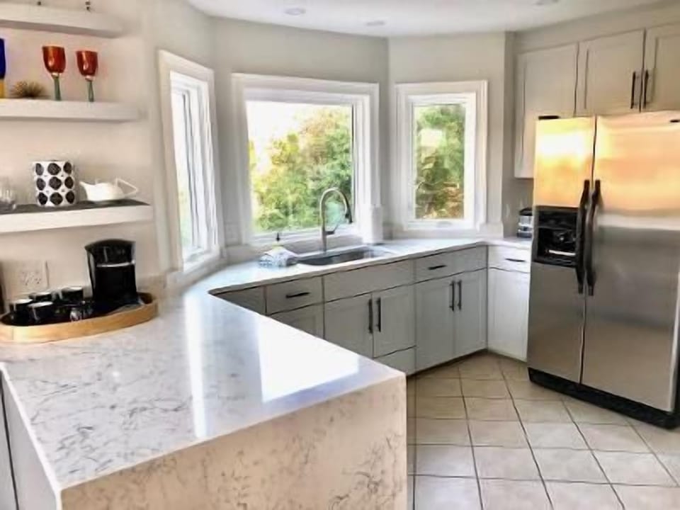 Kitchen with marble countertops, new cabinets!