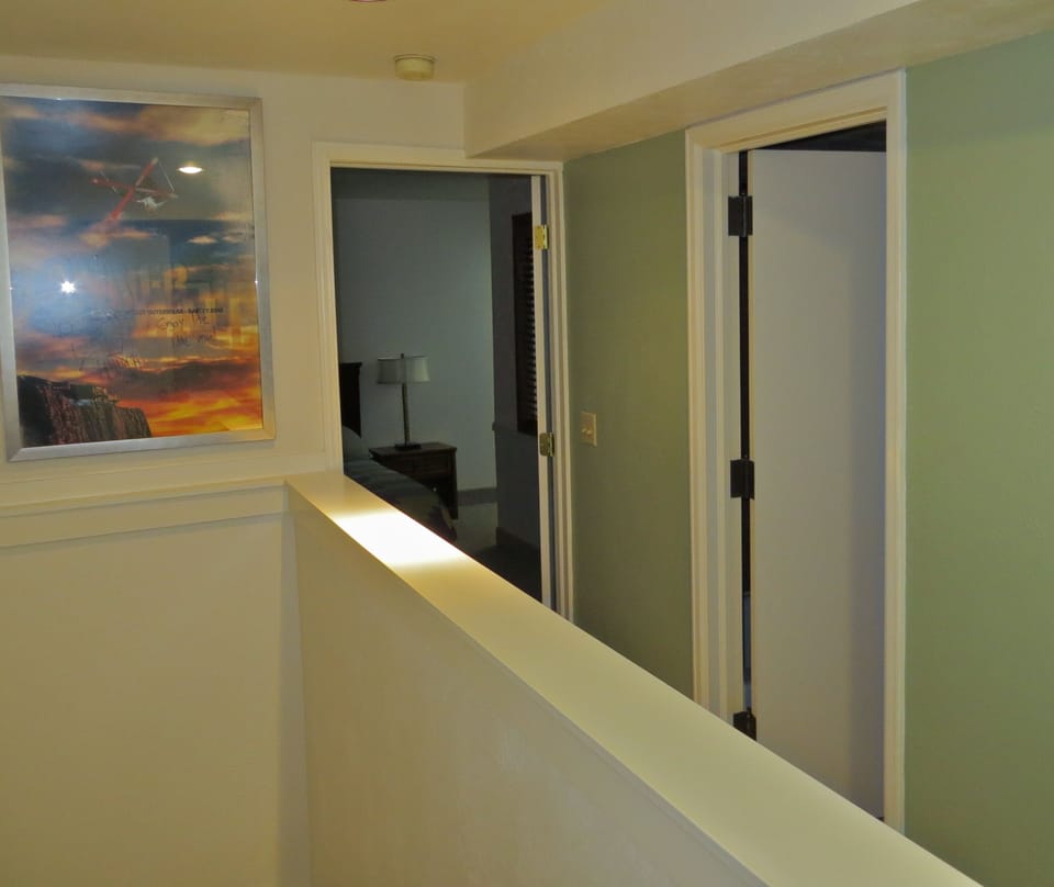 Upstairs hallway to bathroom and bedroom