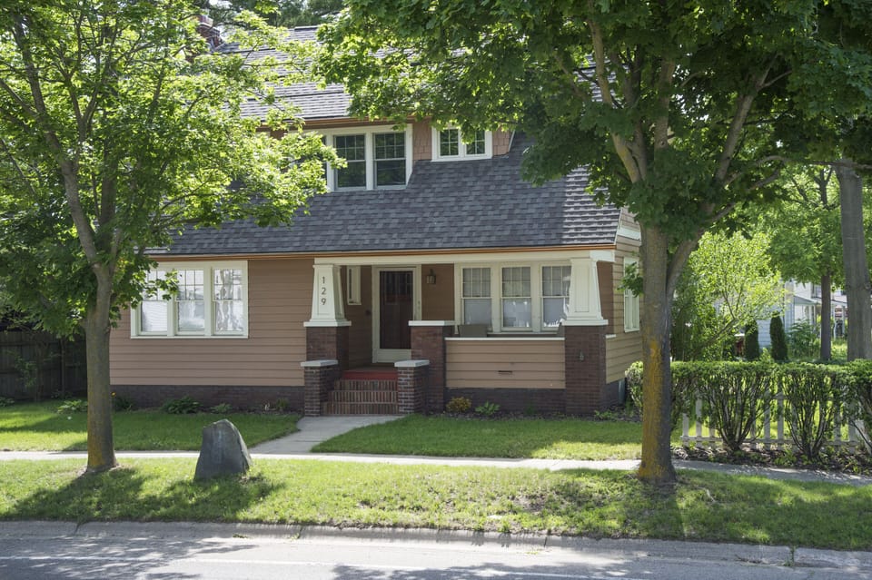 The Bobeda Bungalow is steps to downtown Flushing and has ample  parking, 
