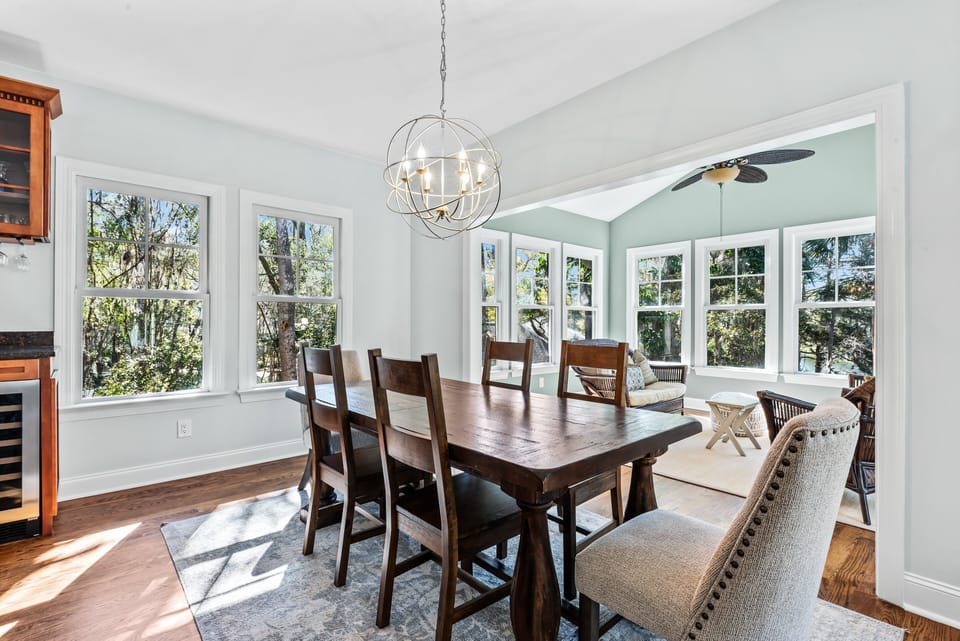 The dining area has a table that seats 6.