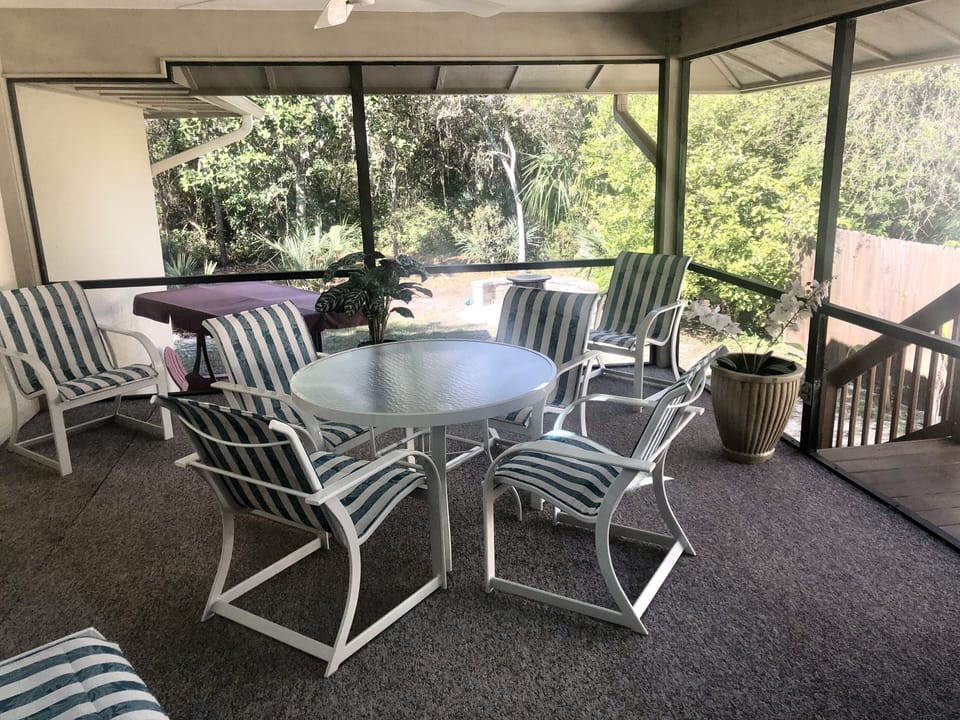 Screened in patio for relaxing.
