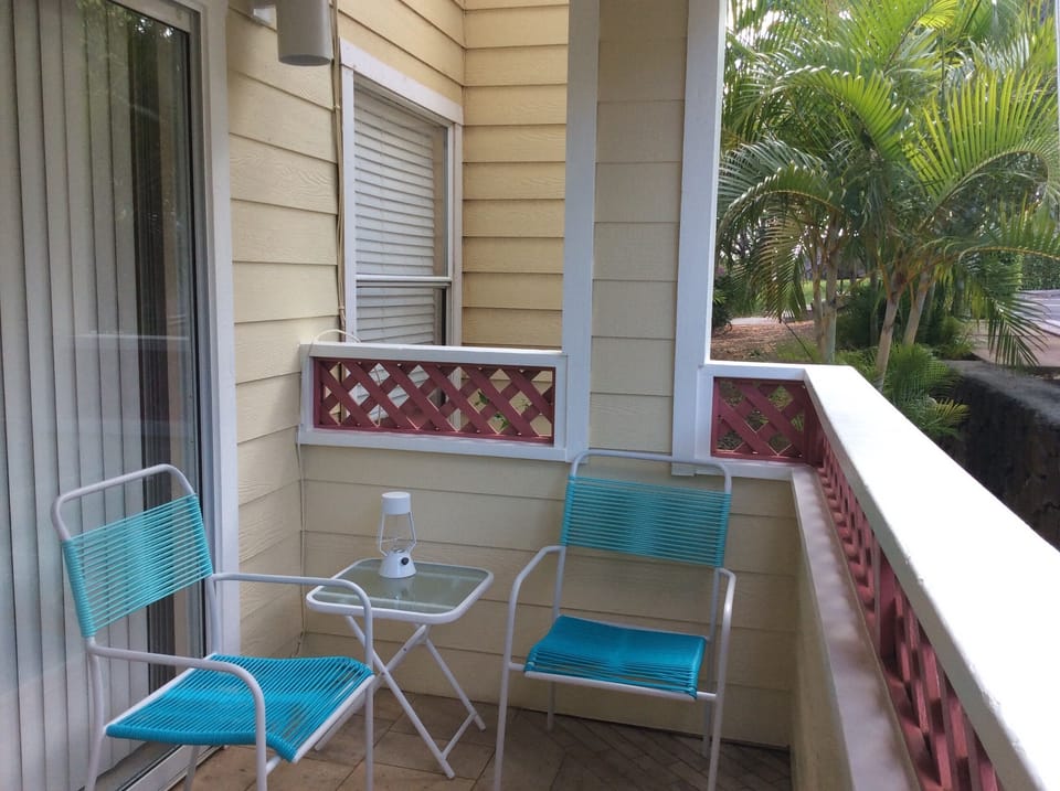 Cute turquoise chairs to have your morning coffee on patio 