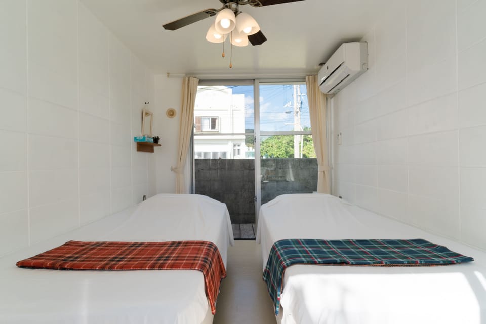 Twin Room, Shared Bathroom | In-room safe, WiFi (free), bed sheets