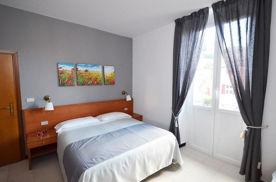 Family Room, Balcony | In-room safe, desk, free WiFi, bed sheets
