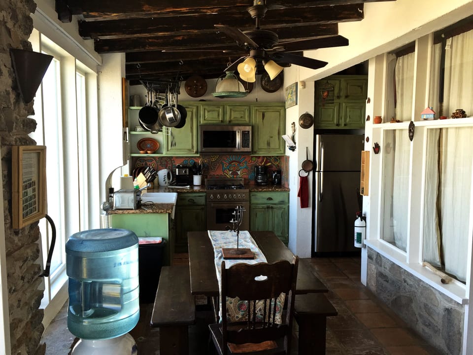 The dining room beckons you to enjoy your meal while enjoying the sea view.