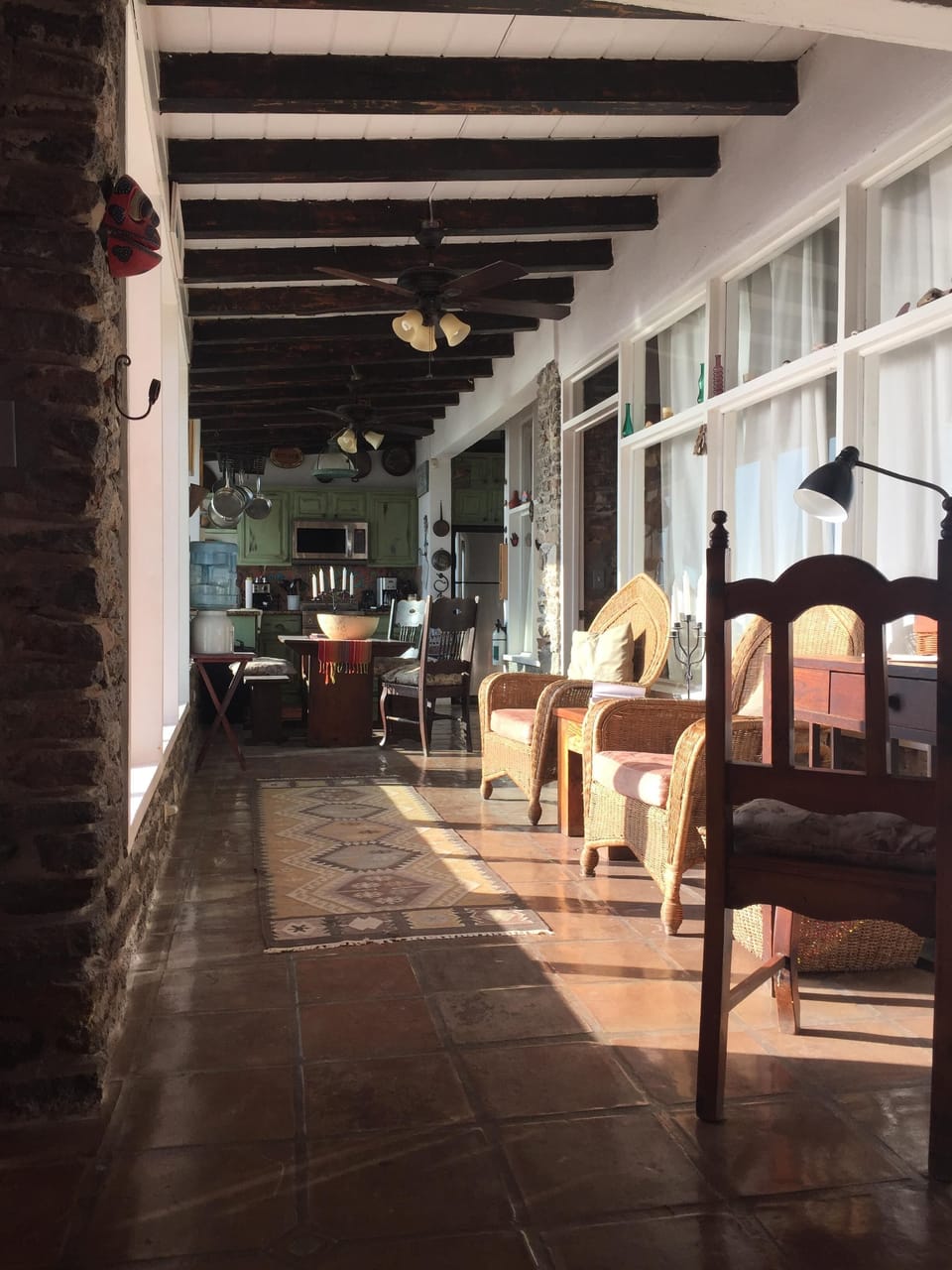 Hallway to Kitchen with windows to the ocean