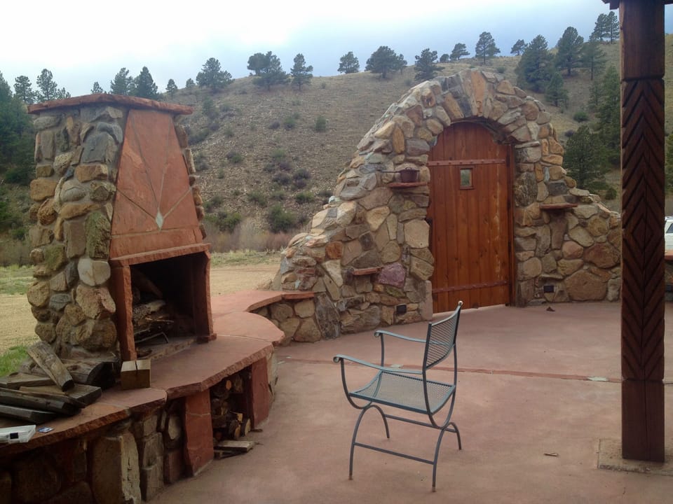 Ground level patio and fire place. Remember to bring your own wood! :) 