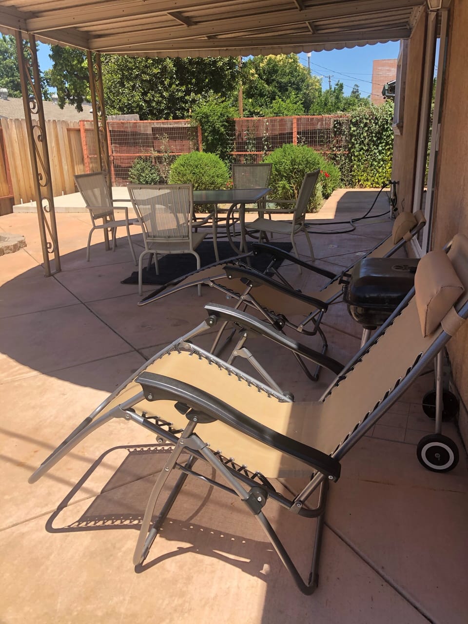 Fence backyard with chairs 