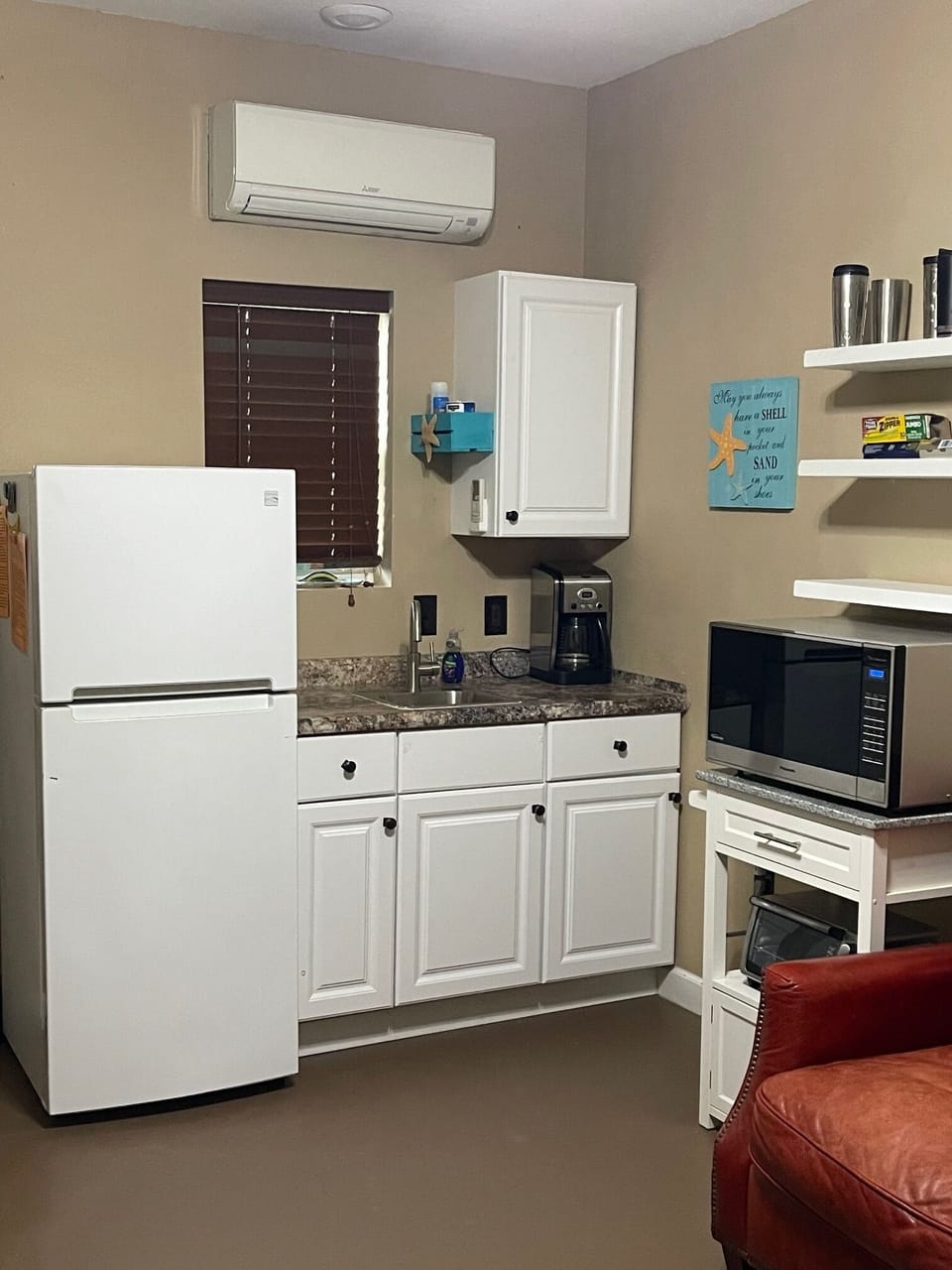 Fridge, microwave, drip coffee pot.