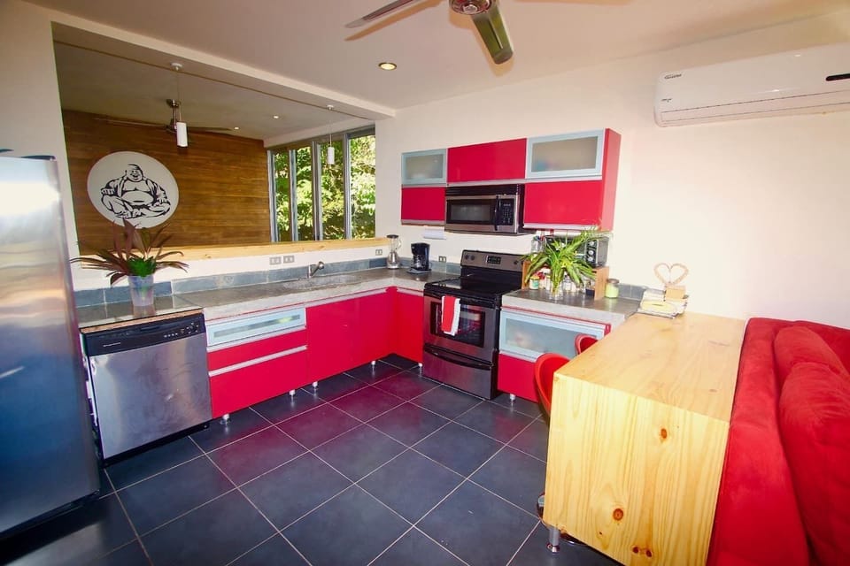 Fully stocked kitchen and breakfast nook.