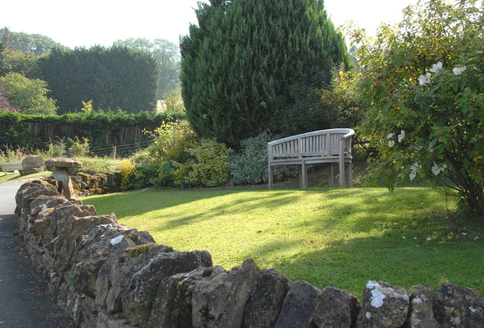 Sit and take in the view on the bench, ideally positioned to capture the stunning panoramic views across the Cotswolds and beyond