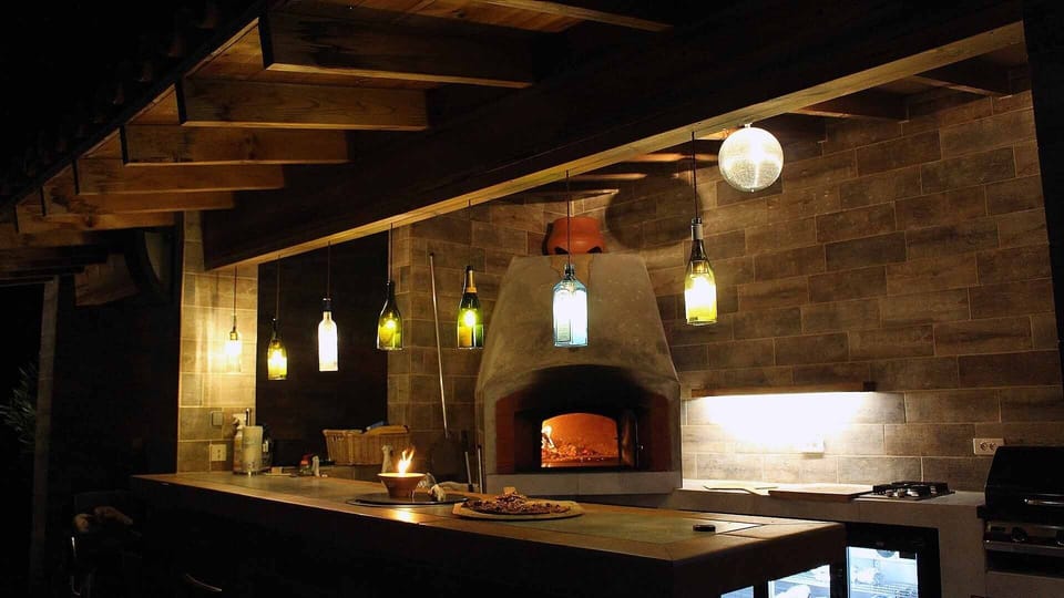 Pool Bar / Outside kitchen by night