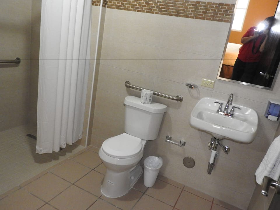 Shower, eco-friendly toiletries, hair dryer, towels