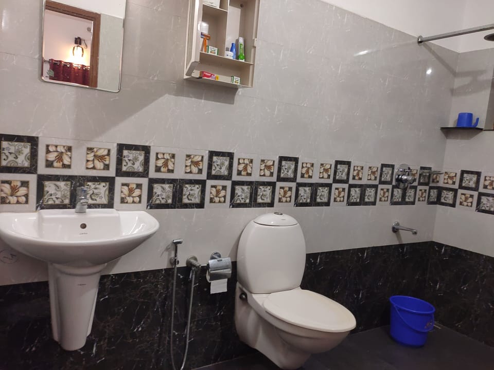 Family Double Room, 1 Bedroom, River View | Bathroom | Shower, rainfall showerhead, bathrobes, slippers