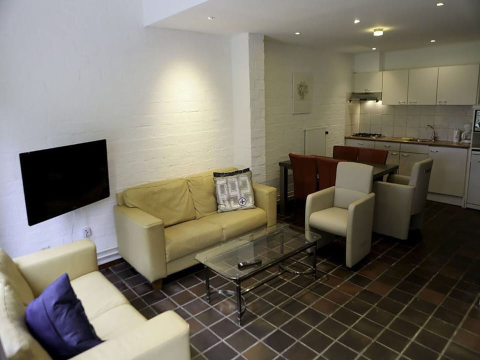 Furniture, Property, Couch, Comfort, Interior Design, Lighting, Living Room, Table, Floor, Flooring