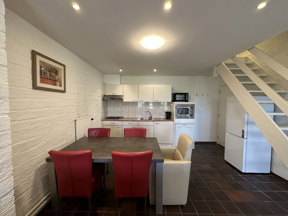 Property, Furniture, Table, Chair, Picture Frame, Interior Design, Flooring, Hall, Wood, Floor