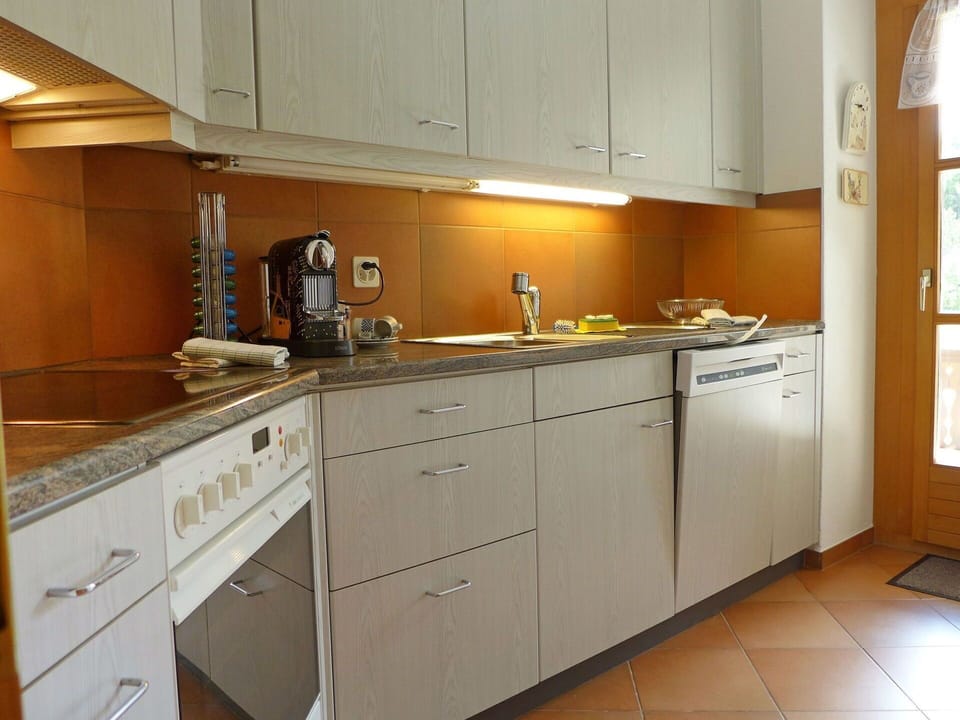 Countertop, Cabinetry, Kitchen, Furniture, Room, Property, Lighting, Major Appliance, Drawer, Floor