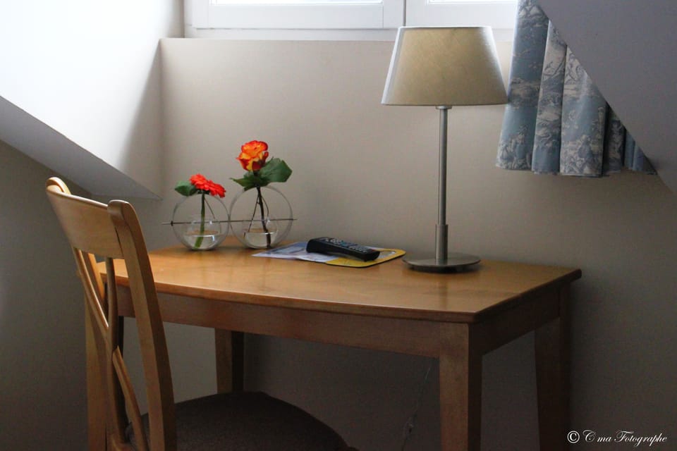 Desk, blackout drapes, soundproofing, rollaway beds