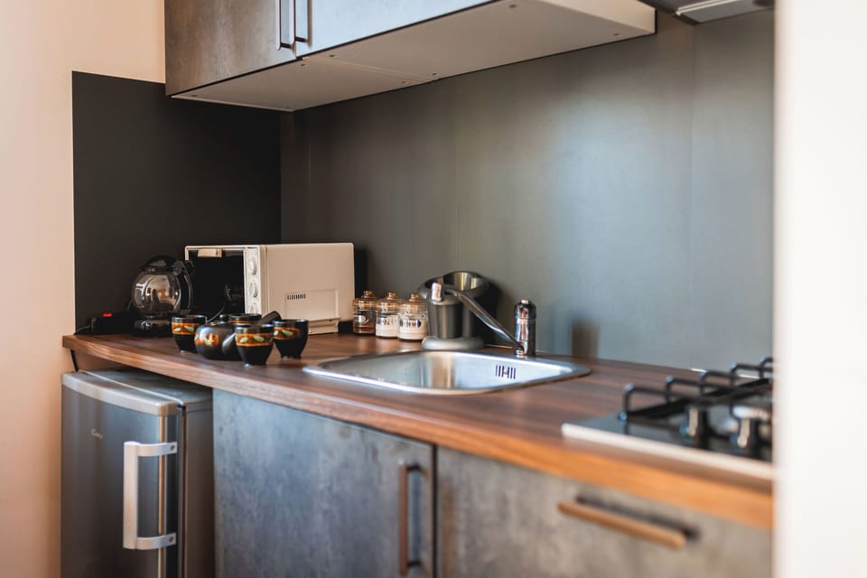 Quadruple Room, Garden View | Private kitchen | Fridge, spices, paper towels