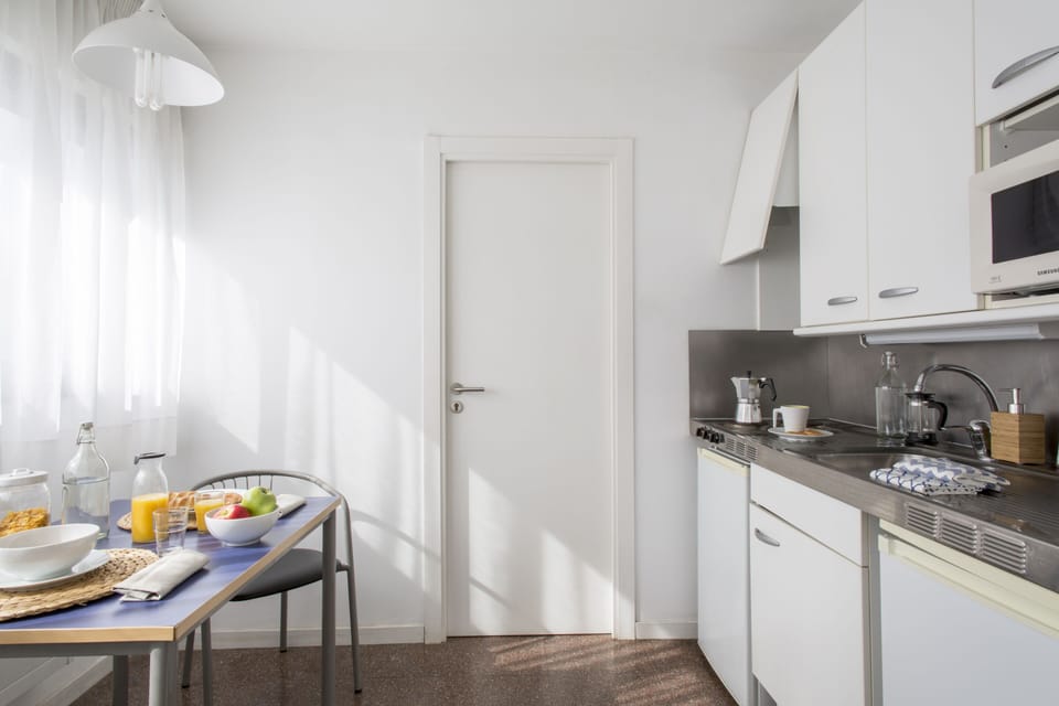 Fridge, microwave, cookware/dishes/utensils