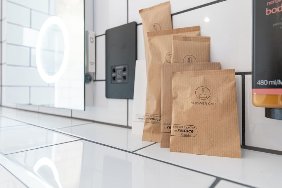 Apartment, 1 Queen Bed, Accessible | Bathroom | Combined shower/tub, eco-friendly toiletries, hair dryer, towels