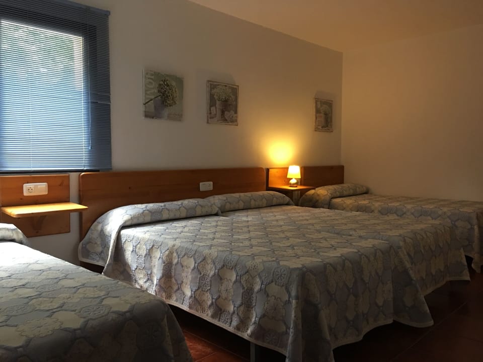 Family Room, 1 Bedroom (no pets allowed) | Free cribs/infant beds, free WiFi, bed sheets