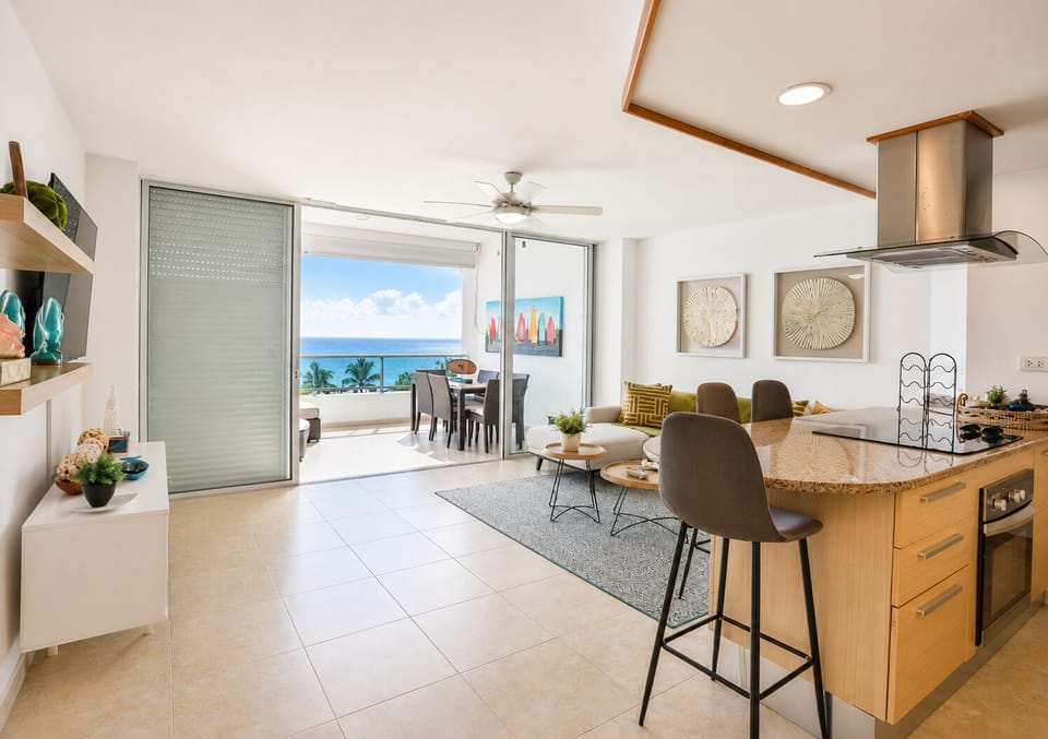 Beachfront Living Room – Relax with A/C, Smart TV, and ocean views — your cozy corner by the beach.