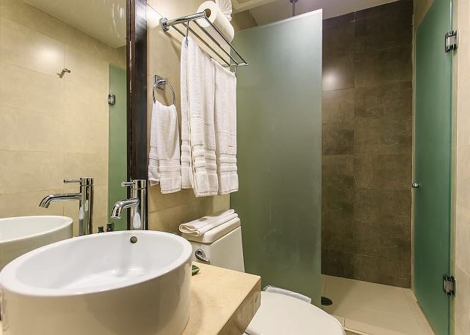 Condo | Bathroom | Shower, free toiletries, hair dryer, towels