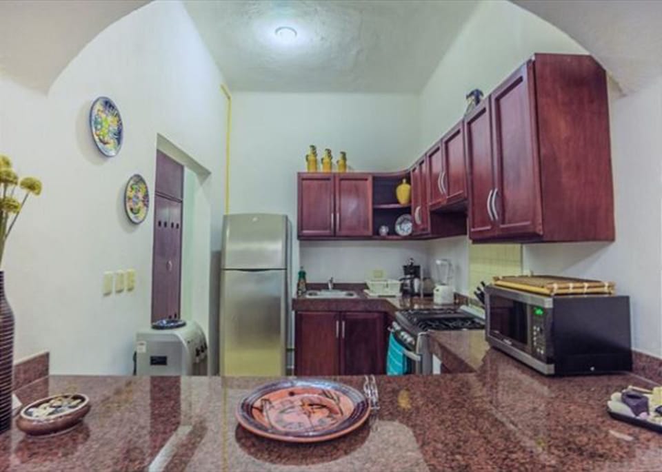 Apartment | Private kitchen | Full-size fridge, microwave, oven, stovetop