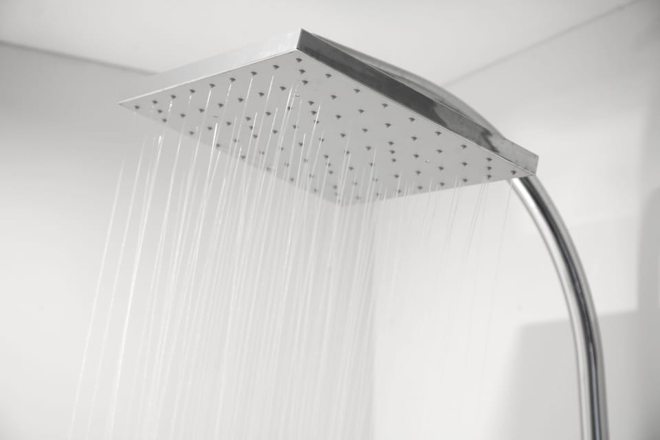 Shower, rainfall showerhead, free toiletries, hair dryer