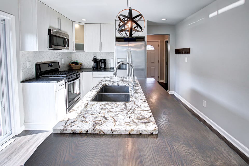 Beautiful granite countertops with live wood edge.