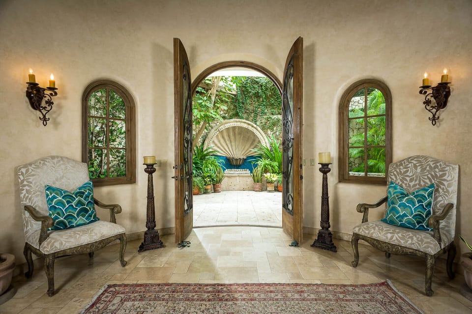 Experience the highest form of luxury when you walk through the grand entrance of this Cabo villa