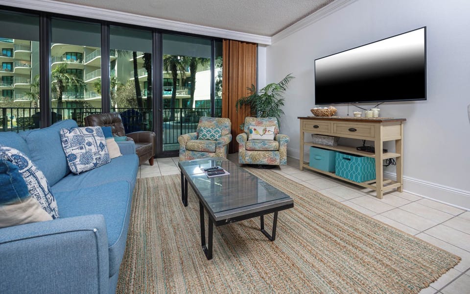 Relax in the inviting living area, where you can stream your favorite shows or read while enjoying balcony views