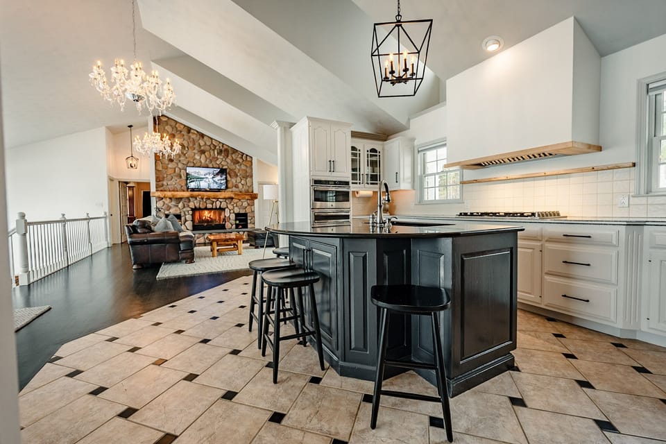 Kitchen: 6Burner Zline cooktop, Commercial Vent, and high end cookware 